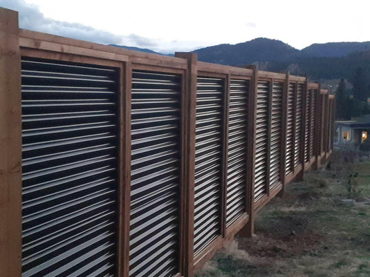 horizontal corrugated metal and wood fence 