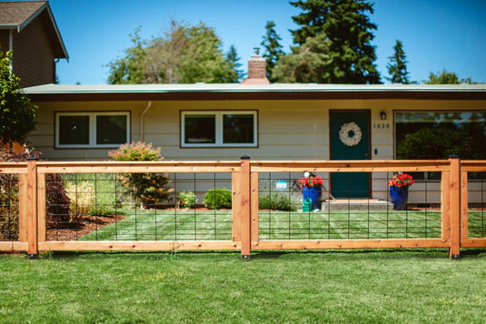 Hog Wire Fences vs. Traditional Wood Fences: Which is Right for You?