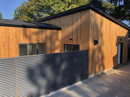 black corrugated metal horizontal fence