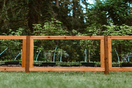 residential wood framed hog wire fence for yard