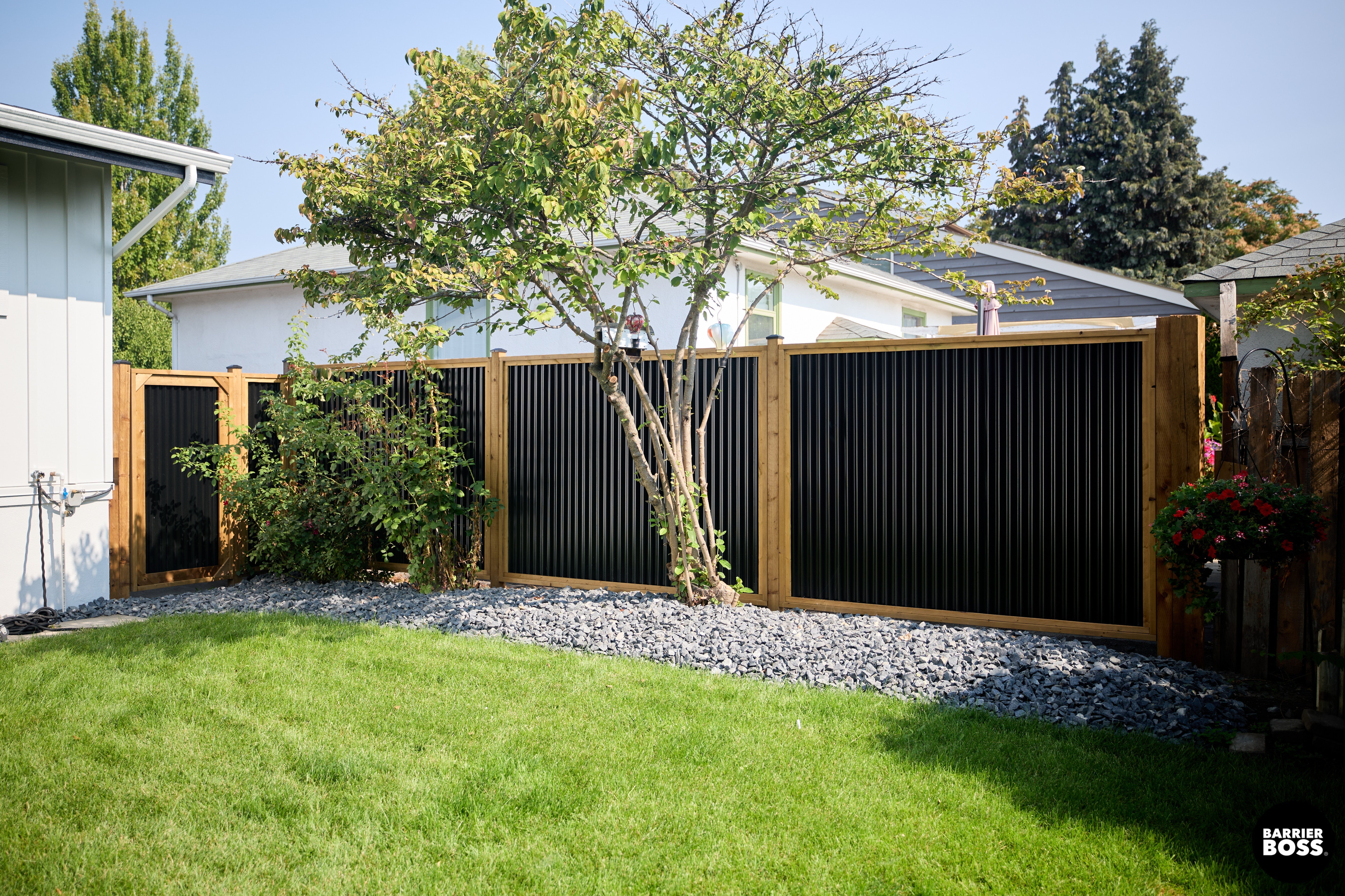 Corrugated metal fence panels, HDP NoFade, 26-gauge HDP steel   BarrierBoss Canada
