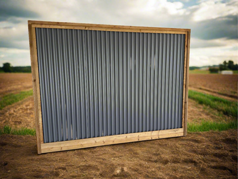 Load image into Gallery viewer, Corrugated Metal Fence Framed in Brown Pressure Treated Lumber - BarrierBoss™
