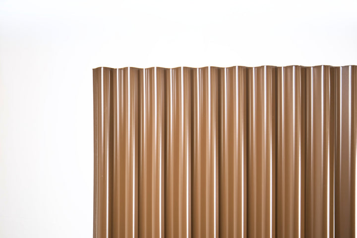 Coffee brown corrugated metal fence panels, HDP NoFade, warm earthy tone -- BarrierBoss Canada