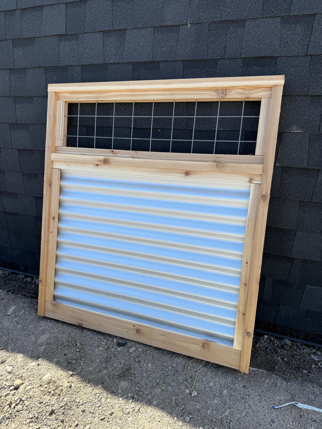 Corrugated Metal Fence with Hog Wire Fence Toppers - The Cabot Panel - BarrierBoss™