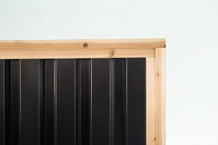 Deep-groove ribbed metal privacy fence panels with western red cedar frame