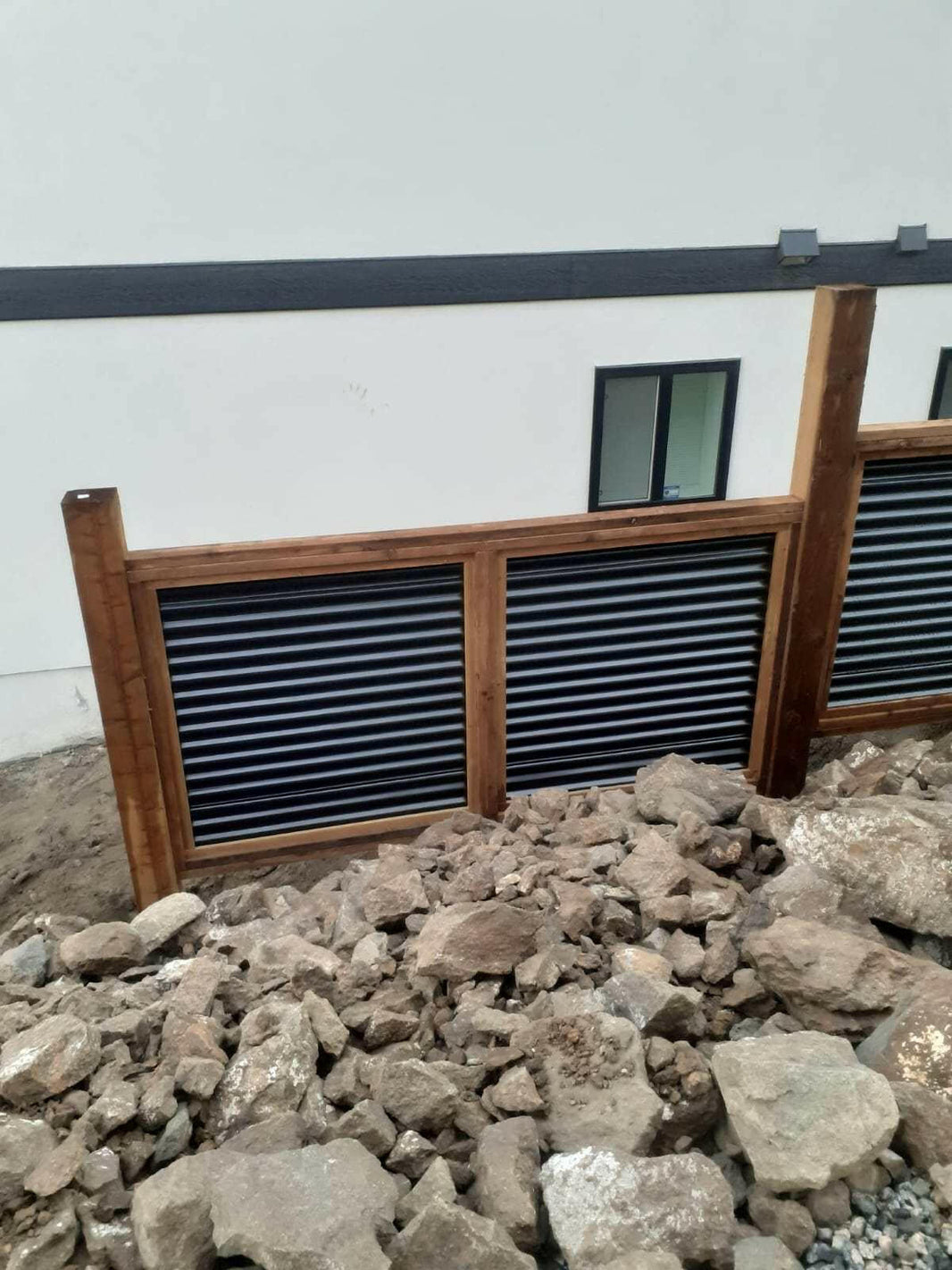 The Wood and Metal Fence Panel - Wind and Warp Resistant - The Fort Knox - BarrierBoss™