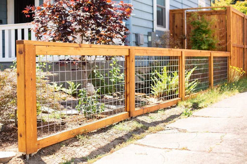 Silver wire fence hog panels for gates and privacy partitions.